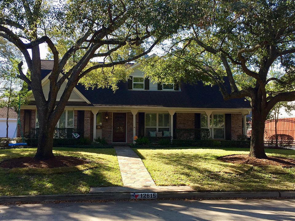 Front with gorgeous trees. 