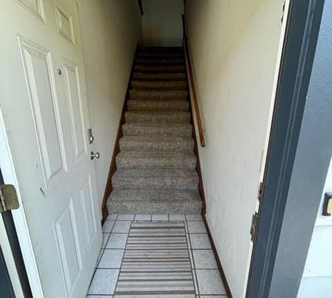 Ground level entry with stairs up to the living area.
