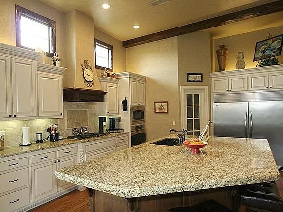 Gourmet kitchen with commercial fridge/freezer, and Dbl edged granite