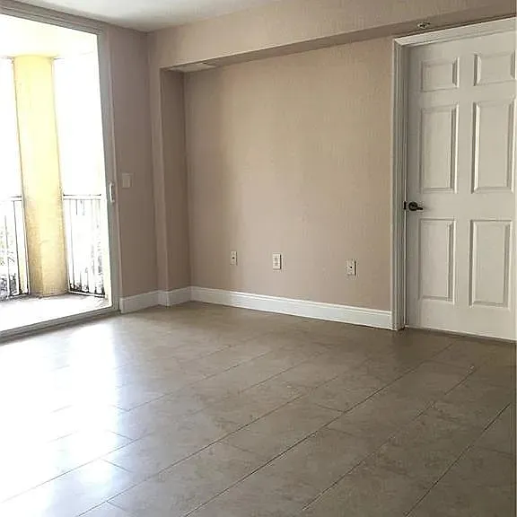Living room, balcony and Master Bedroom entrance