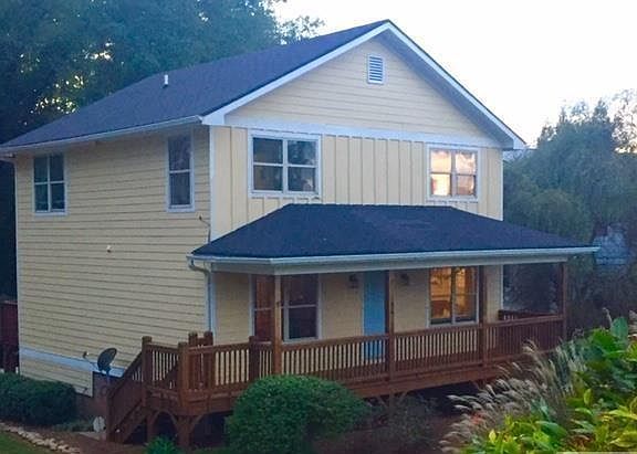 Side view of landscape with front deck
