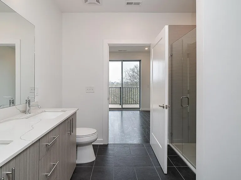 Large Master Bath and Glass Shower overlook the Bedroom and Endless Views.