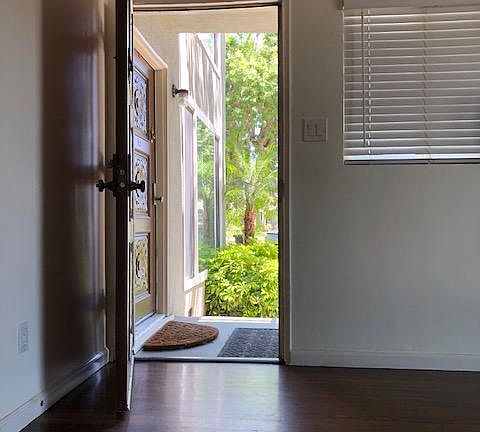 Looking out front door from living room.