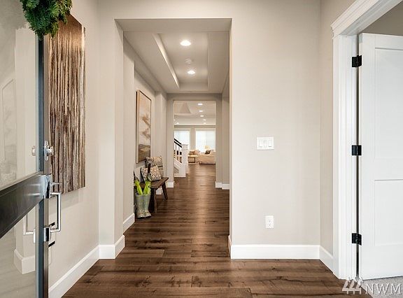 Lot 1 - Bentley Plan - 3868 sf, 5 bedrooms including main floor bedroom w/ ensuite 3/4 bath, and a 1/2 bath, den, bonus room, 3 -Car tandem garage and covered outdoor space.  Lot 1 is complete and Move-in Ready!