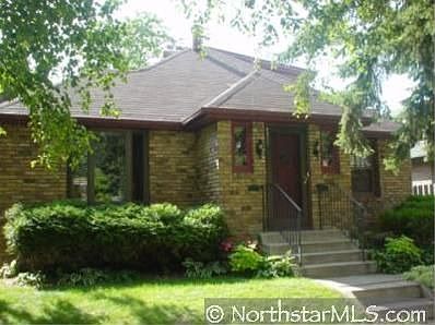 Cute brick home on a cozy block close to area parks and lakes!