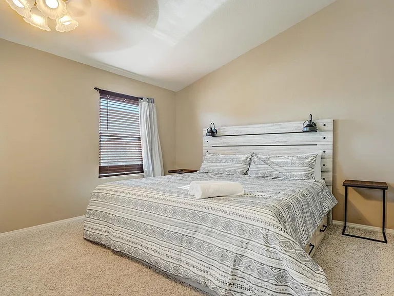 Master bedroom has a pull out couch and a TV!