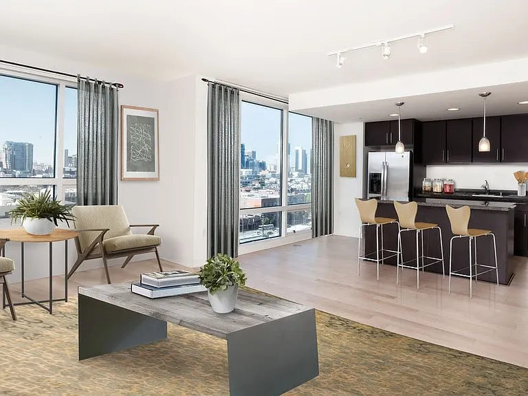 Classic Phase III kitchen, living, and dining areas with hard surface flooring