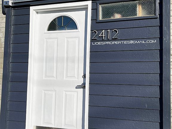 MAIN ENTRANCE TO 2412 APARTMENT COMPLEX