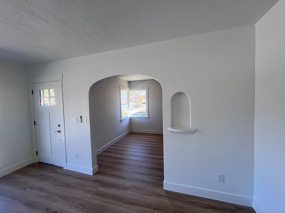 Living room with view of the kitchen