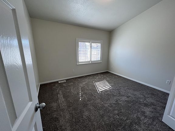 5th image of 202 E White Spruce Cv