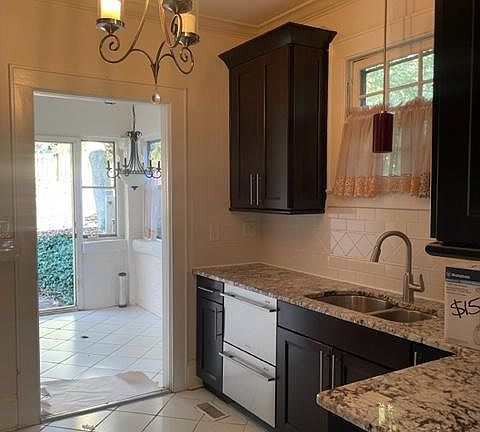 Back entrance through a mudroom or potential breakfast nook.