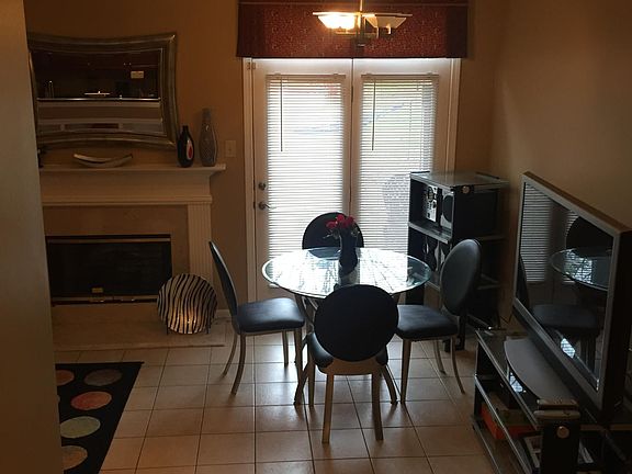 Dining Area opens to concrete Patio Area/Courtyard