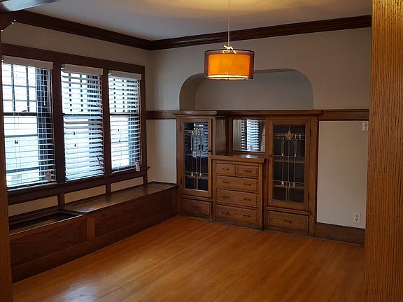 Spacious and bright dining area with beautiful built-ins