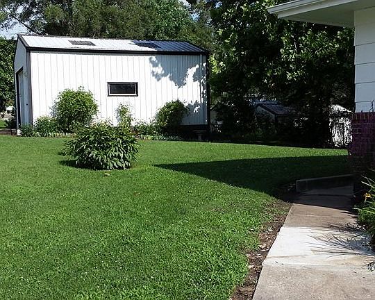 Front sidewalk to garage