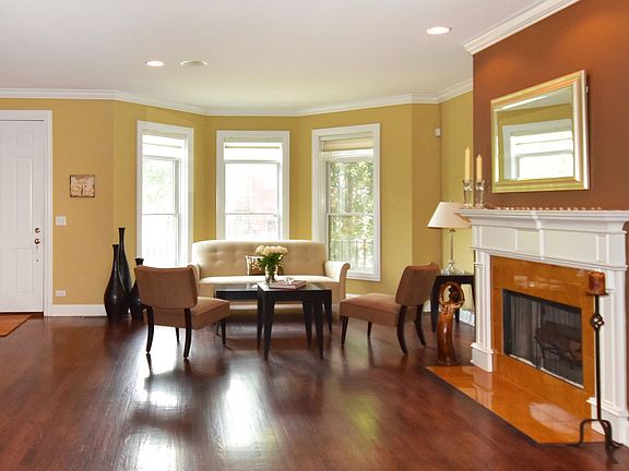 Open Floorplan with LR and DR.  Bow window and fireplace give a gracious feel to the entry. Gleaming