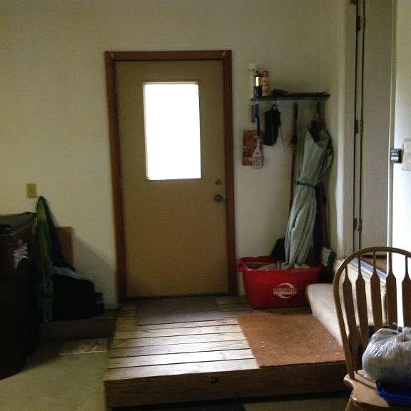 Garage entrance to rear deck