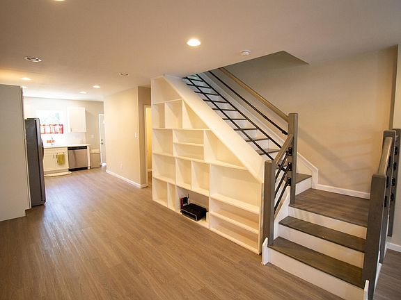 Stairs up, Kitchen, half bath and backdoor