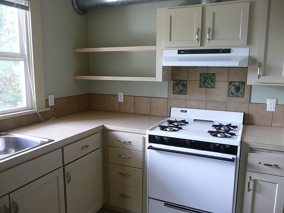 Kitchen with handmade tile