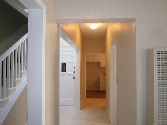 HALLWAY LOOKING AT FRONT & KITCHEN