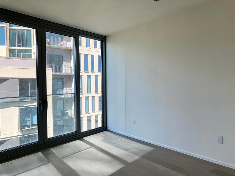 Units features 9 foot+ ceilings and is very quiet with the double pane windows.