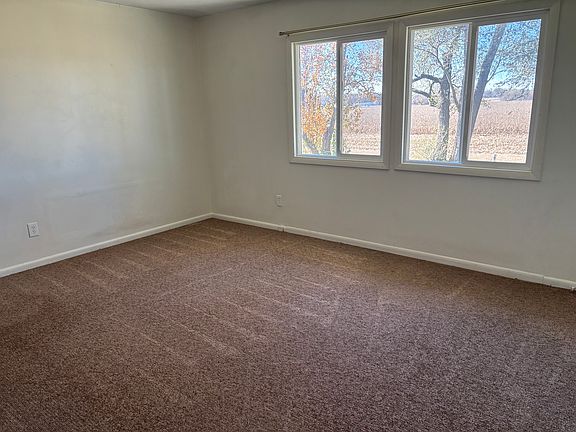 This room could be a study/office/dining room or extra bedroom