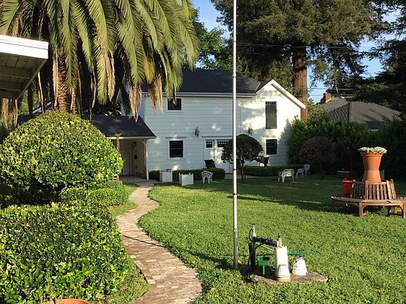 Brick walkway to your covered front door