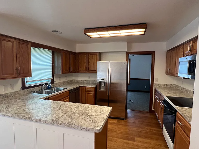 Kitchen view looking in towards the formal dining room