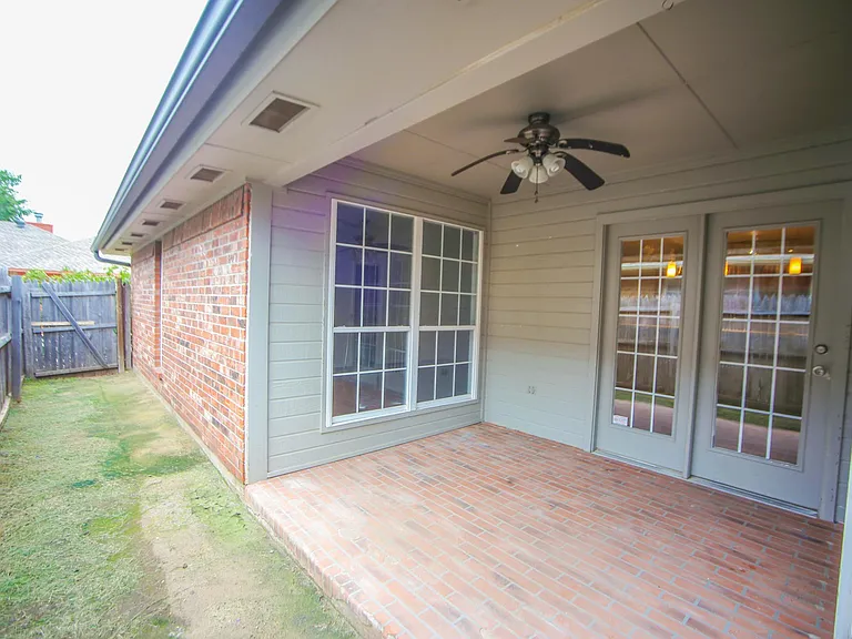Backyard with covered patio nook