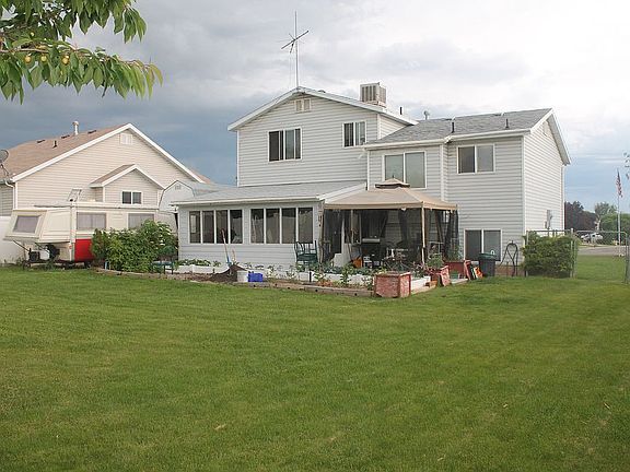 Back: Sunroom, garden, sheds