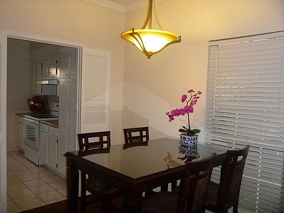 View of dining area and entry of kitchen.