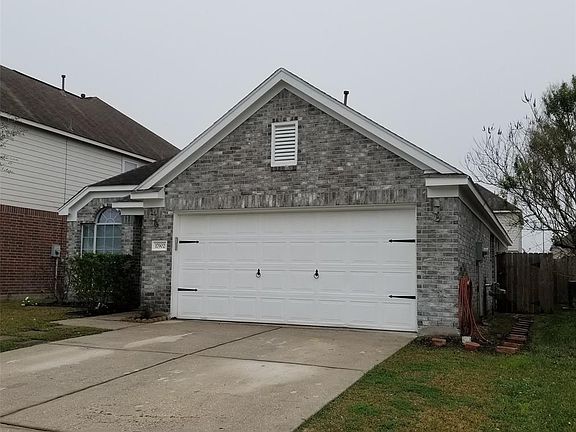 Nice size attached 2 car garage.  Side gate leads to back yard.