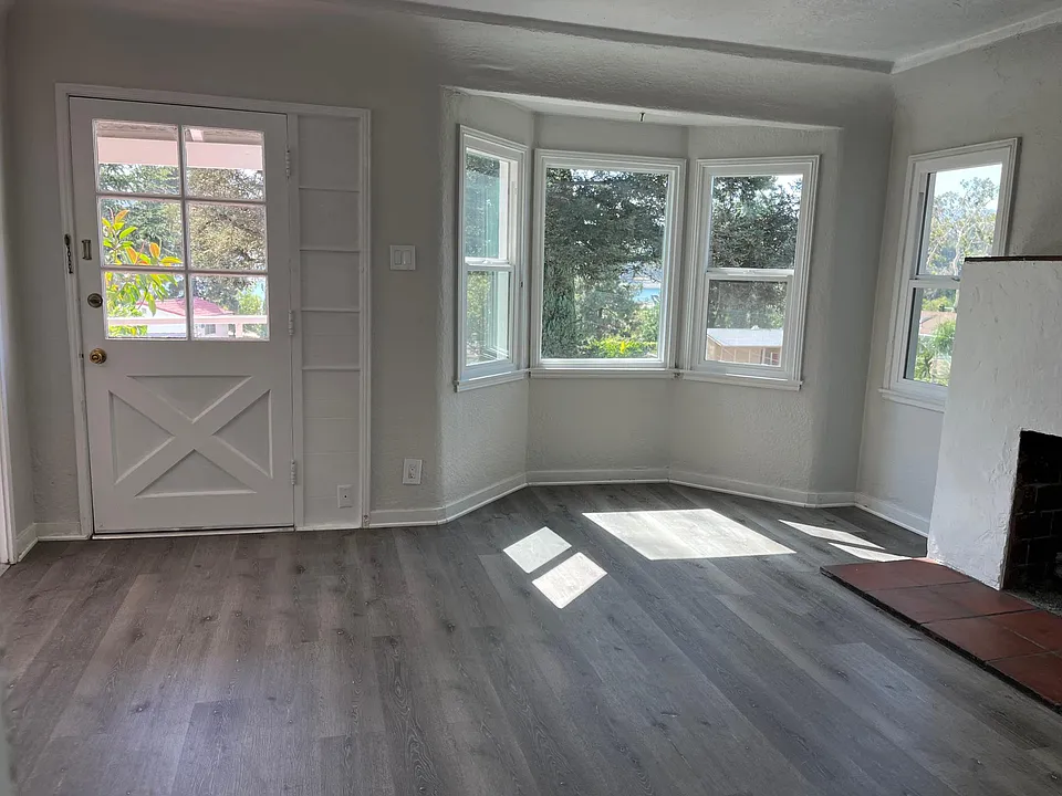 New floors, new windows and freshly painted. View of Silver Lake
