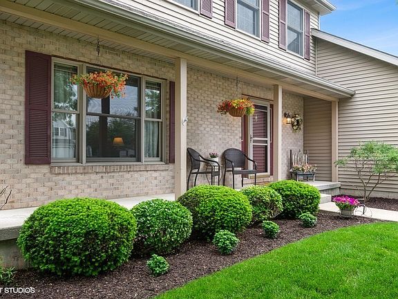 Welcoming front porch and the perfect place to greet your family and friends!