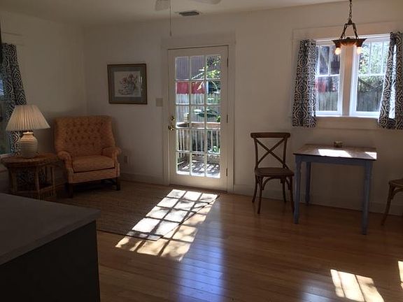 living room and french door leading out to the deck