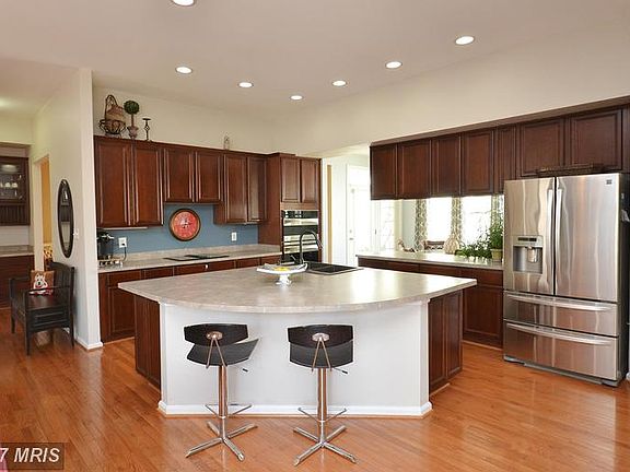 Spacious Kitchen w/ Cherry Cabinets
