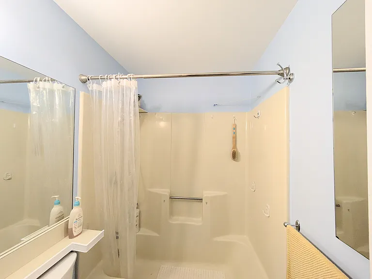 Bathroom with extra storage space behind the mirror
