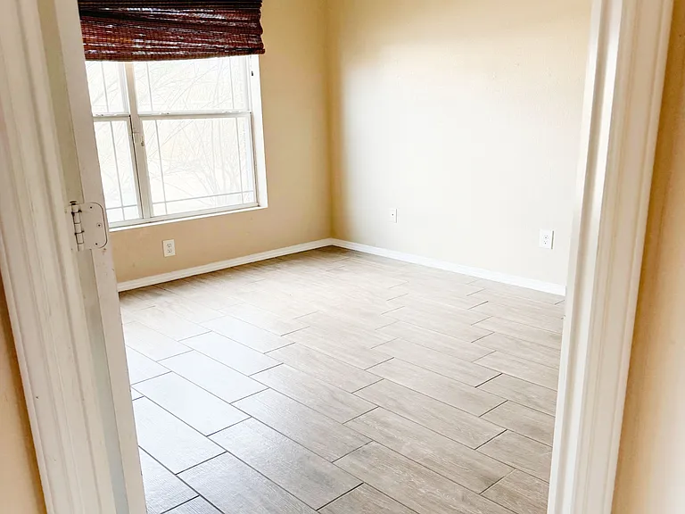Bedroom #3 with also the new ceramic wood tile flooring.