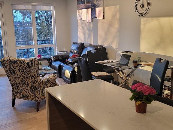 Living room with access to marple top kitchen