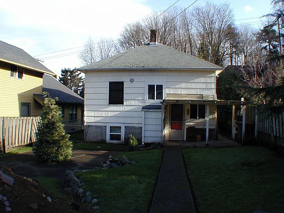 Back of house - West Side with patio & large fenced yard