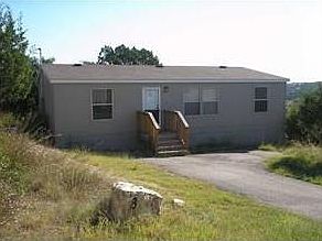 Exterior Front of home that backs to vacant land.