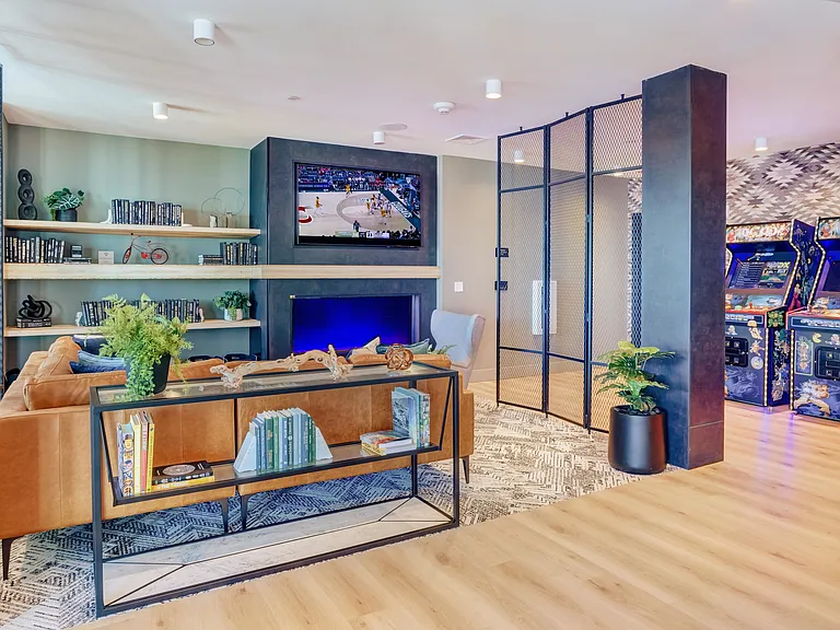 Clubroom and game room with shuffleboard, pool table & outdoor terrace