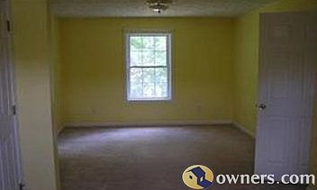 Bedroom..full width of the house. Two closets.