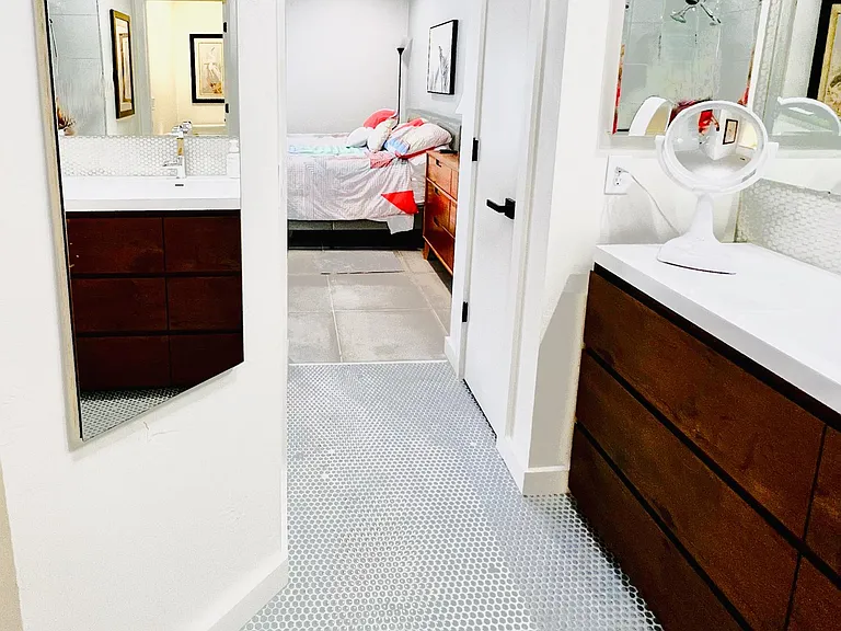 Linen closet within master bath for extra storage