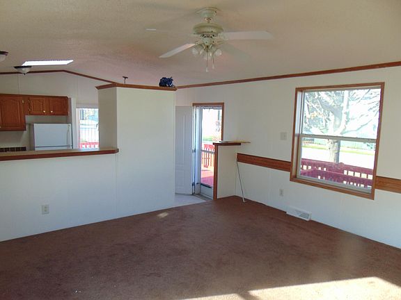 Large front room with step down kitchen.
