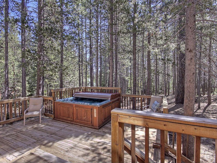 "Back deck with hot tub"