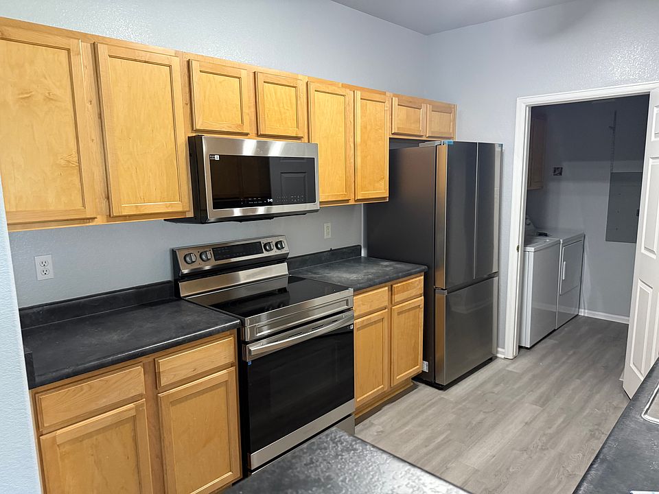 Kitchen with Brand New Stainless Steel Appliances