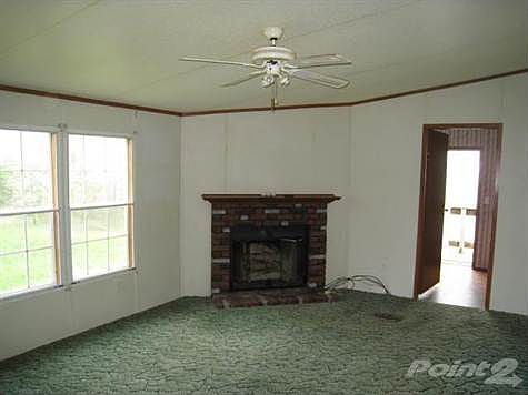 Wood burning fireplace in Family area