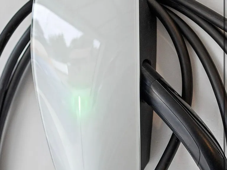 2 car garage has Tesla charge and more storage