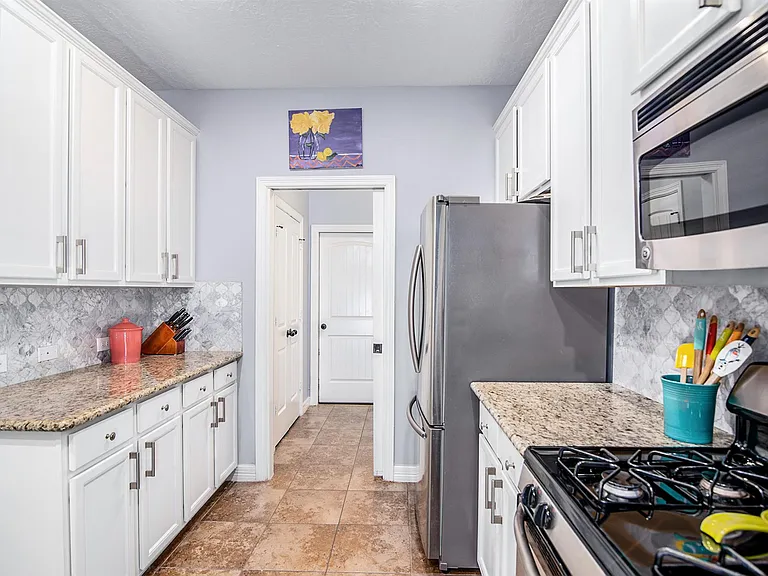 Well-appointed kitchen with abundant cabinet and counter space
