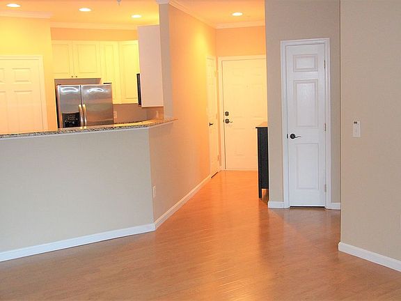 View from LR into Kitchen and hallway